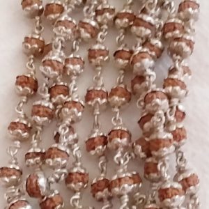 Rudraksh mala  (108+1) 4.5 mm indonesian beads in silver capping and silver wire stringing.